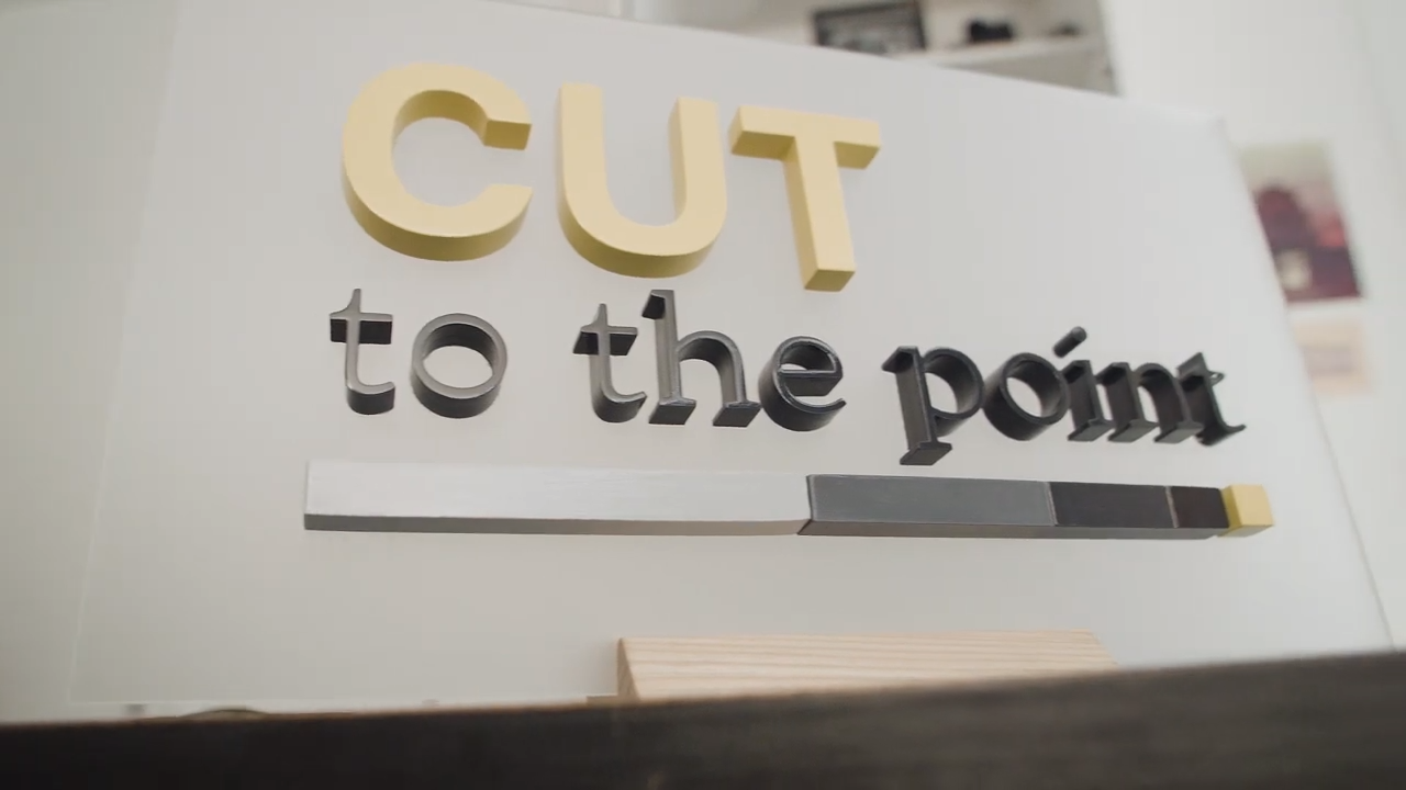 Cut to the Point sign